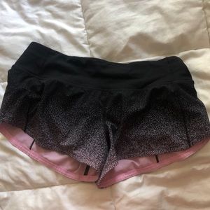 black and pink lululemon “speed up short 2.5”